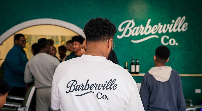 Community gathering inside Barberville Co. barbershop in West Richmond